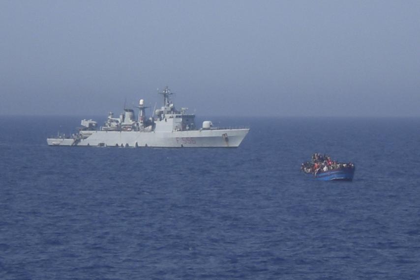 Ship with over 1,000 migrants aboard docks in Italy