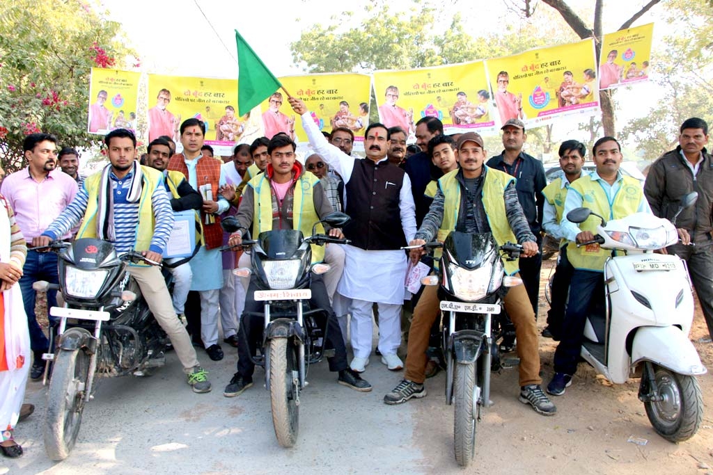 PR Minister Dr. Mishra Administers Pulse Polio Drops to Children