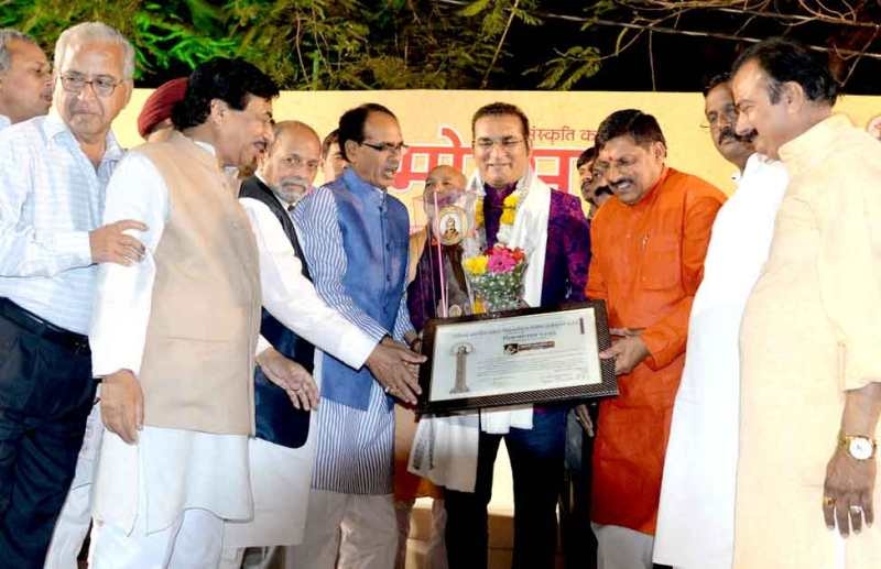 CM Chouhan Honours Playback Singer Abhijeet with Vikramaditya Samman