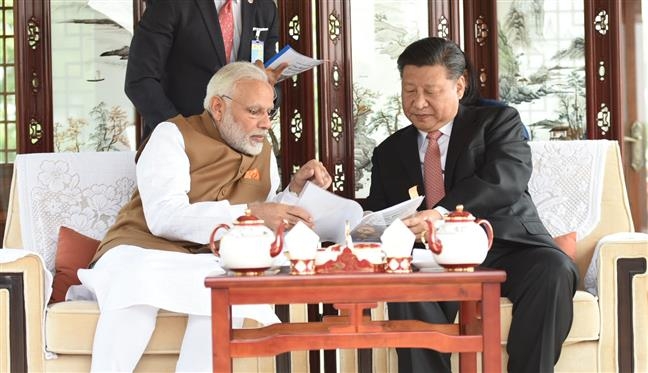 Did a newspaper say “Modi, Xi will MATE 6 times in 24 hours”?