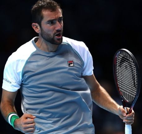  Cilic beats Isner, gets first victory at ATP Finals 