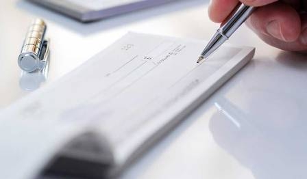 20% interim compensation for the complainant if the check bounces!