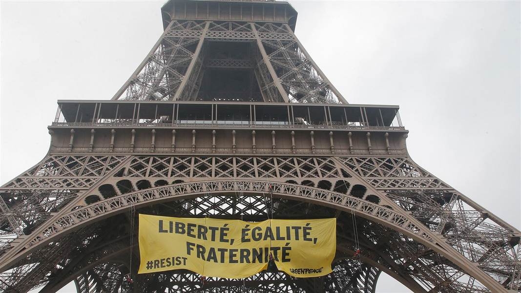  Greenpeace activists hang anti-Le Pen banner on Eiffel Tower 