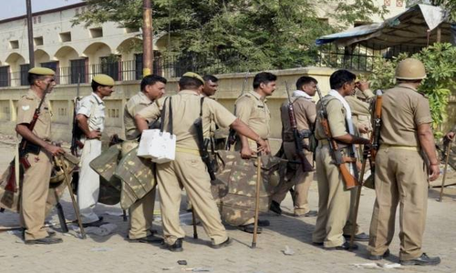  Police officers flee after violence in UP town 