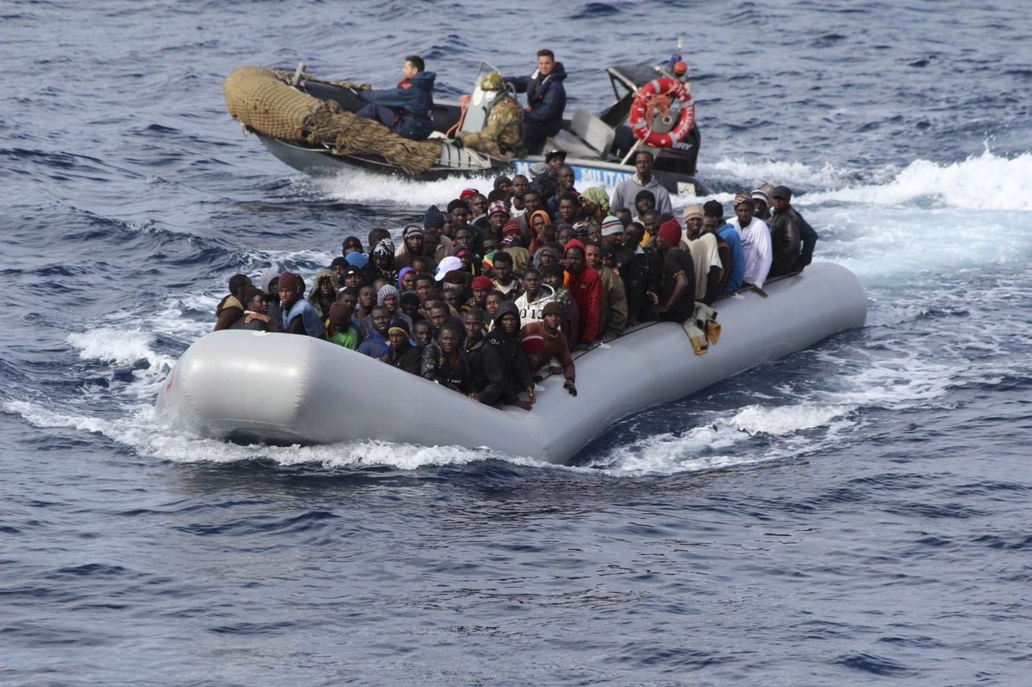  300 rescued migrants land in Italian island 