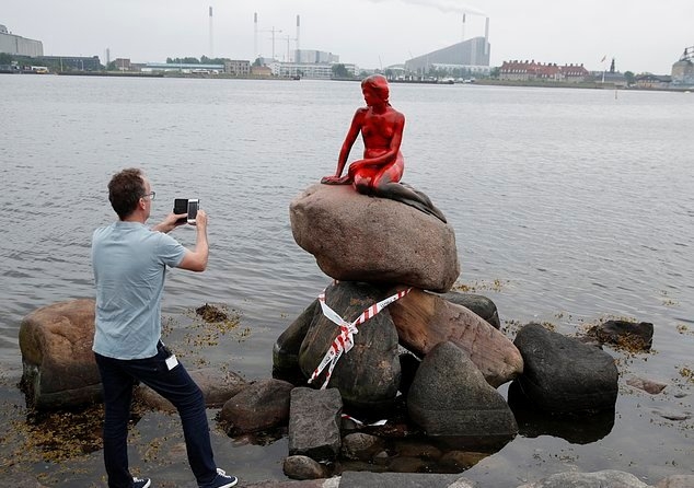  Copenhagen s iconic mermaid statue drenched in blood-red paint 