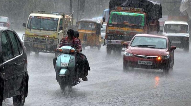  Four people, car washed away in Karnataka 