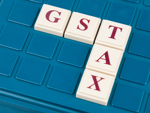   Implement GST in select sectors to test it first  