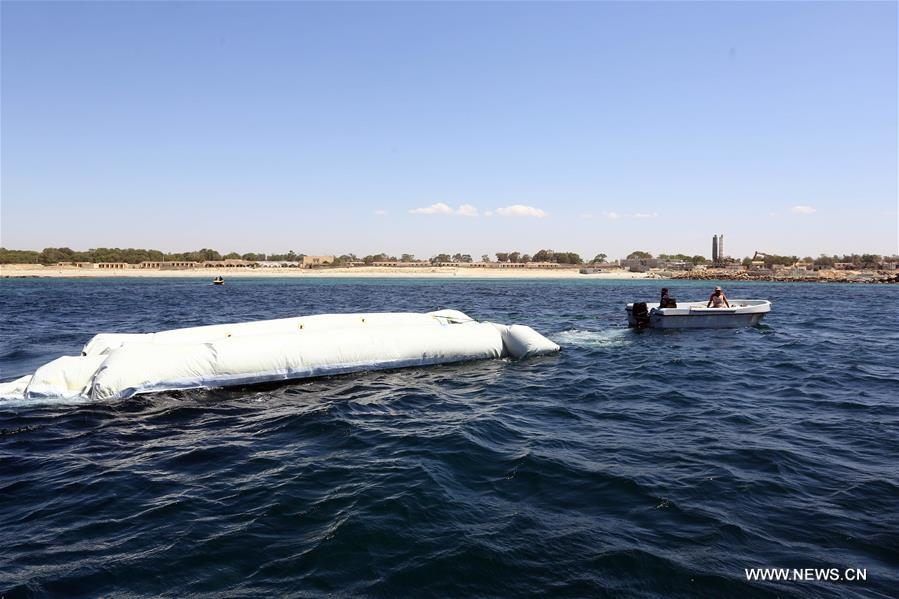 8 migrants drown off Libya coast 