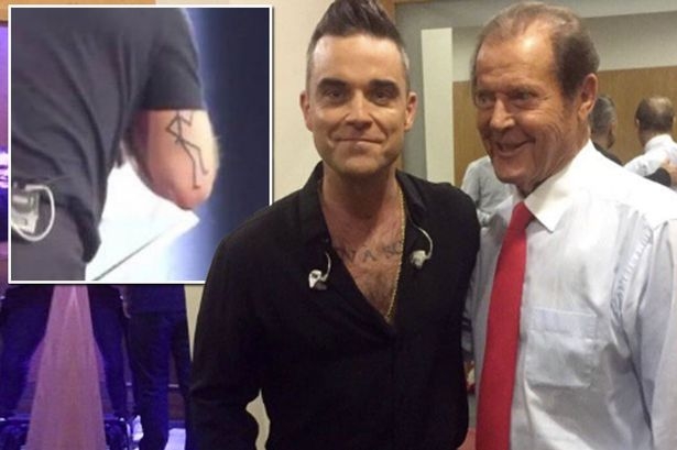  Robbie Williams gets Roger Moore-inspired tattoo 