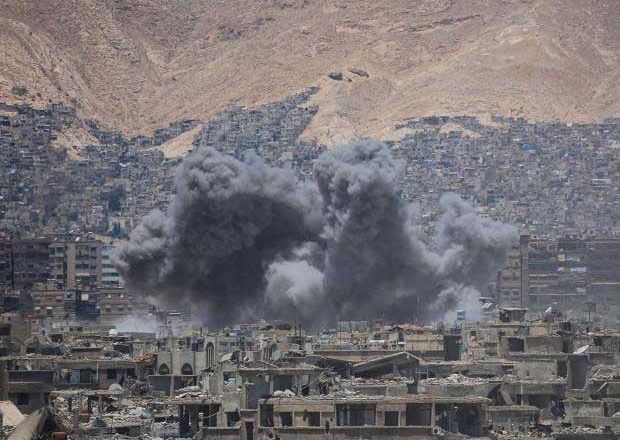  US-led air strike kills 57 in IS-held prison 
