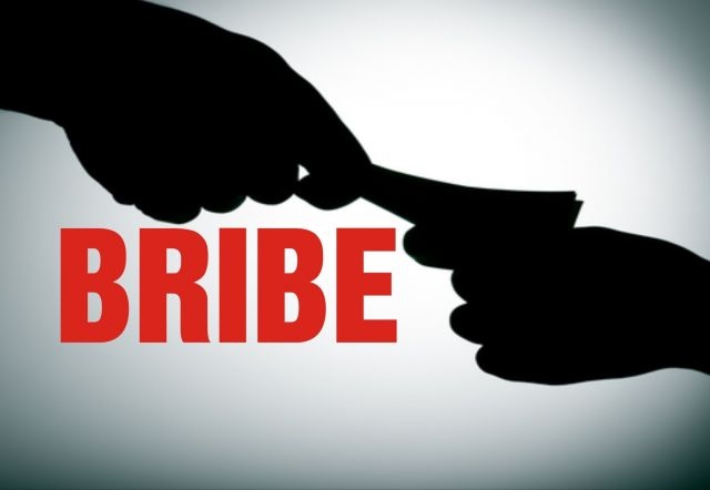  Food officer caught taking bribe in MP 