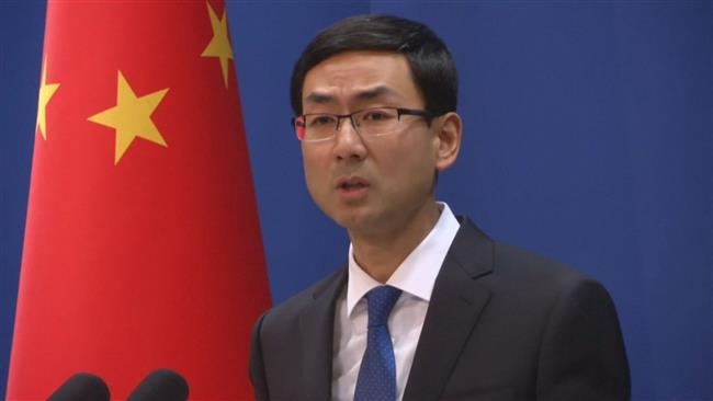  China dismisses outcry over ailing dissident (Lead) 