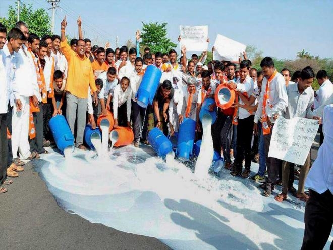  Gujarat farmers throw milk on roads to demand loan waiver 