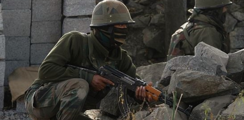  Gunfight on with trapped militants in Kashmir village 