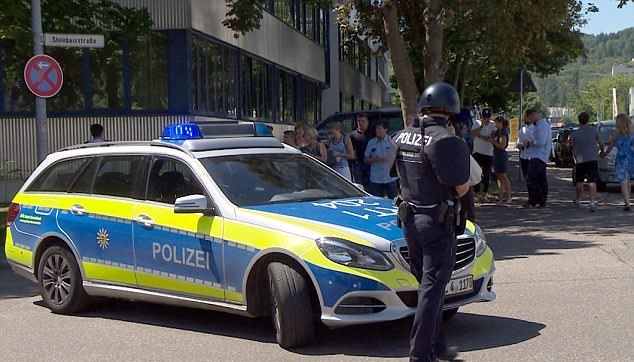  German school evacuated after gunmen seen in ground 